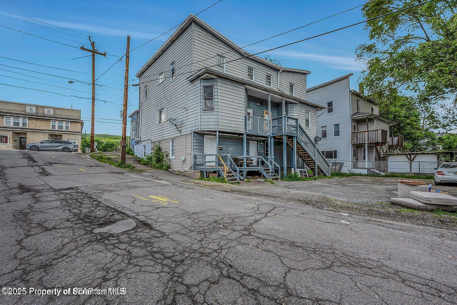 1202 Main Street Dickson City, PA 18519 - Photo 26 of 30 a view of a house with a street