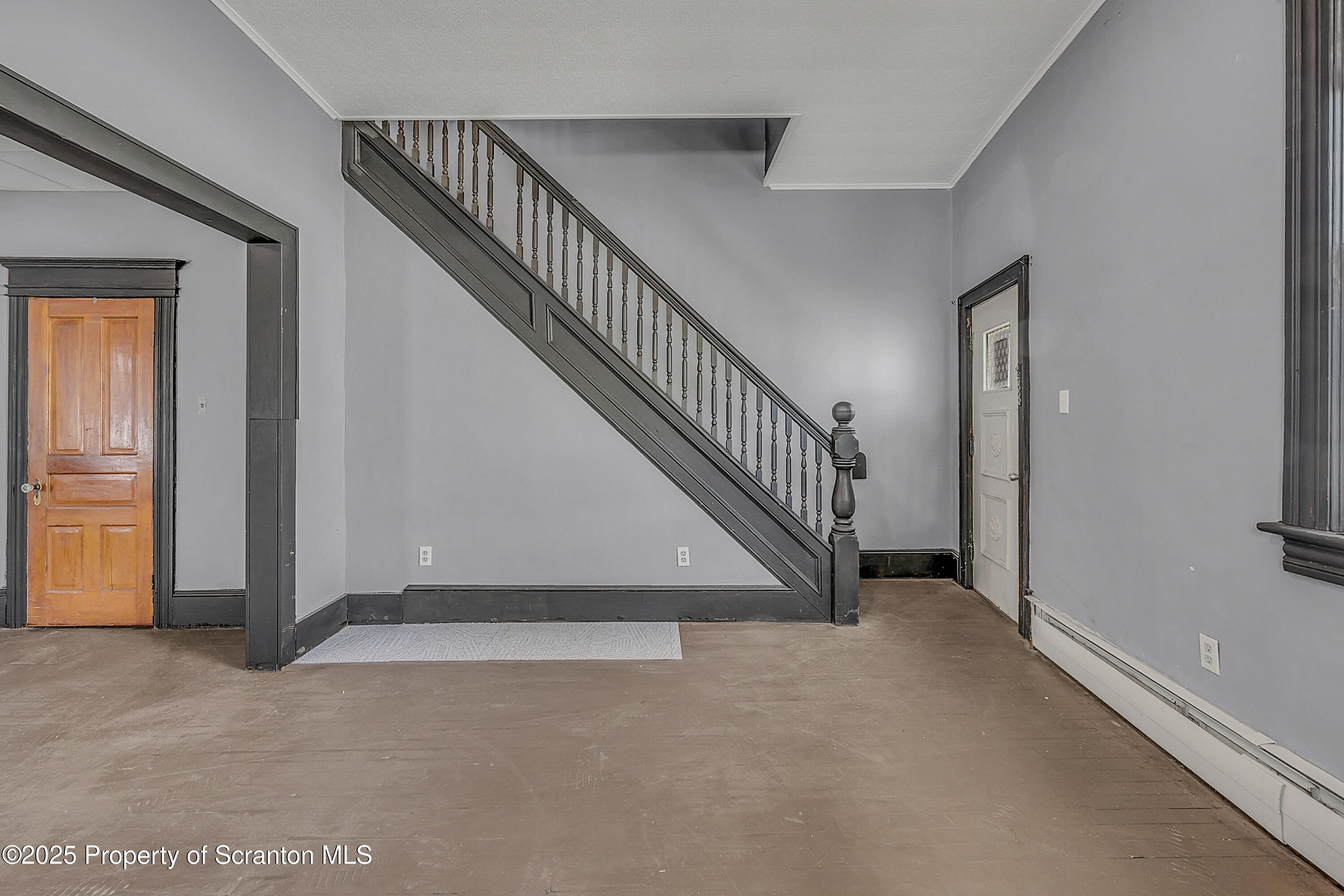 1202 Main Street Dickson City, PA 18519 - Photo 4 of 30 a view of an entryway with staircase