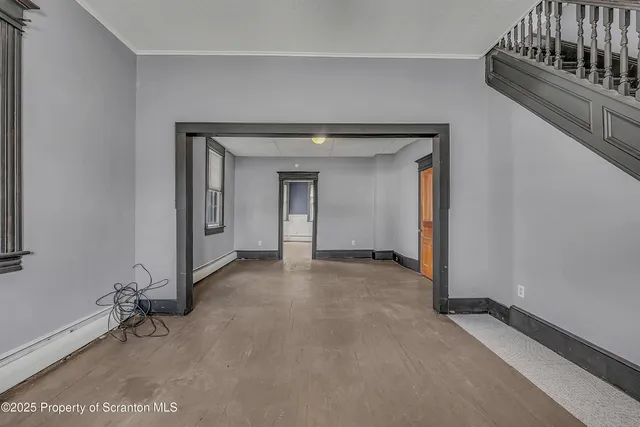 a view of a livingroom with a staircase