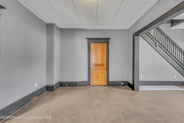 a view of an empty room and window