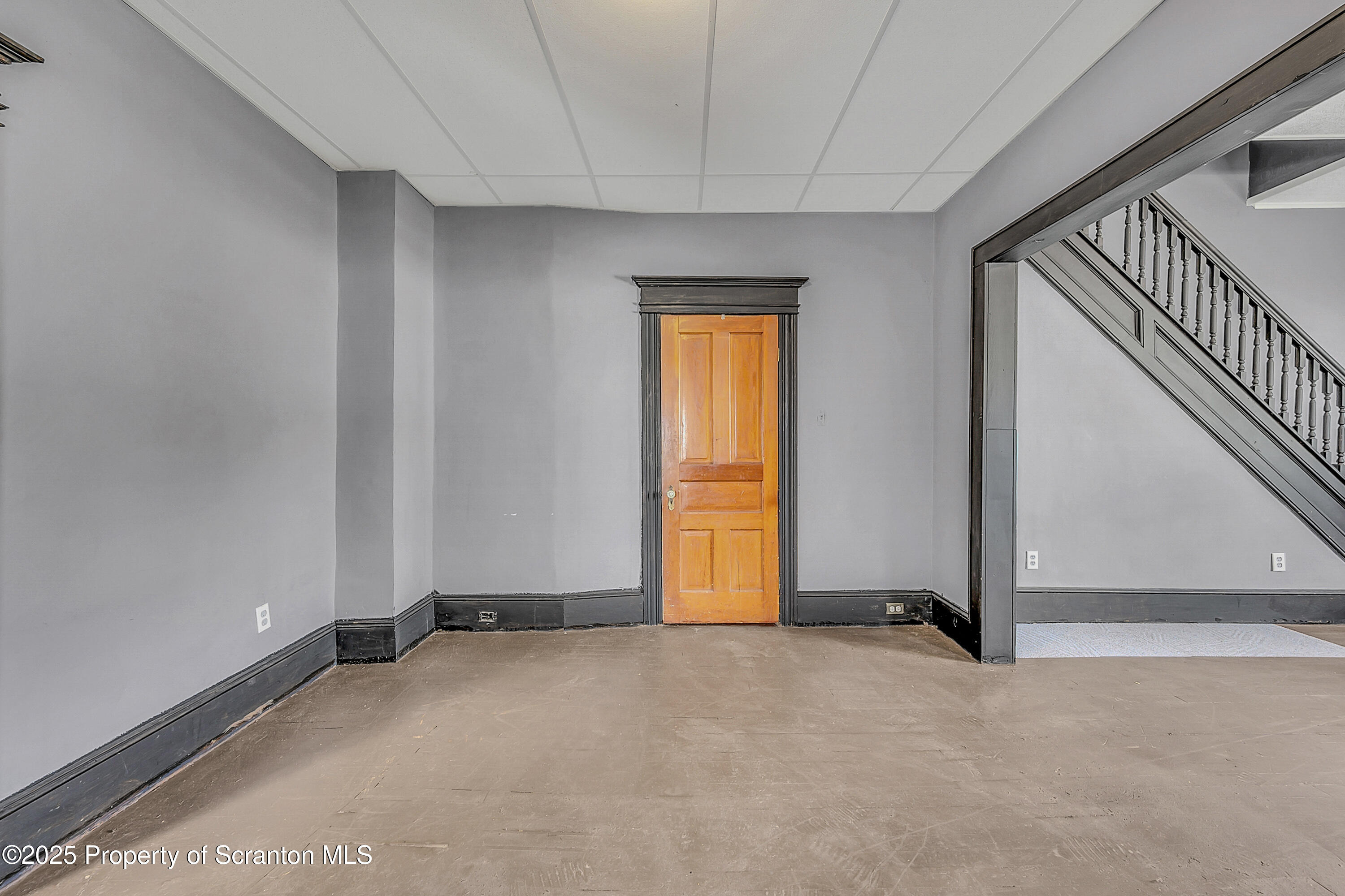 1202 Main Street Dickson City, PA 18519 - Photo 6 of 30 a view of an empty room and window