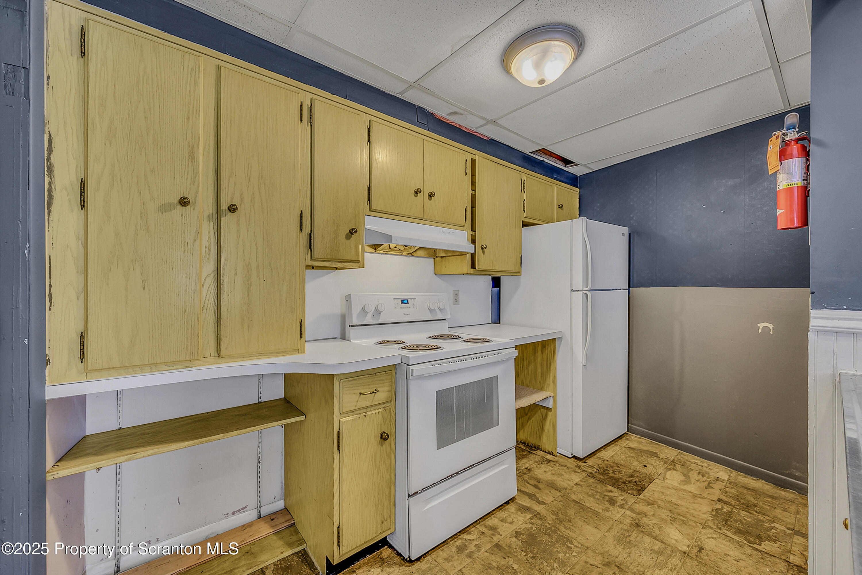 1202 Main Street Dickson City, PA 18519 - Photo 9 of 30 a utility room with cabinets washer and dryer