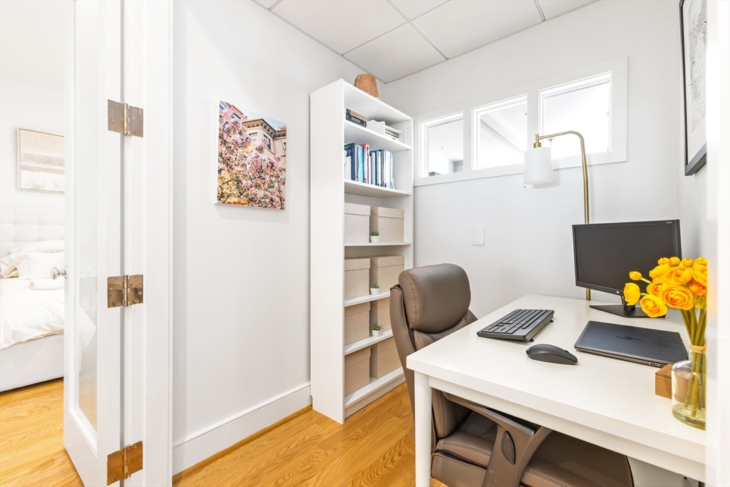 36 A Street, Unit 5C Boston, MA 02127 - Photo 20 of 25 a workspace with furniture and window