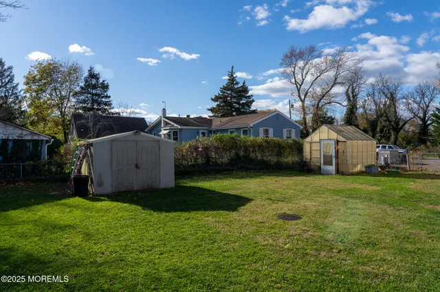 a view of a back yard of the house
