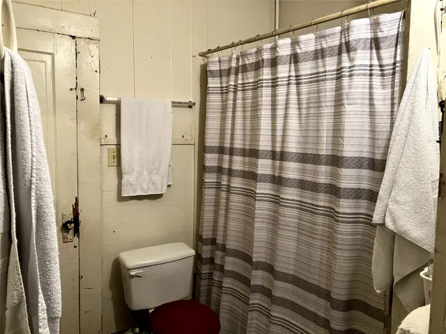 a bathroom with a sink and toilet