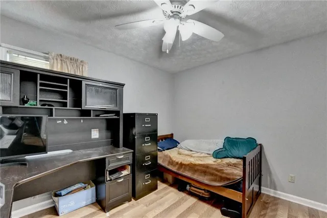 a room with furniture and flat screen tv