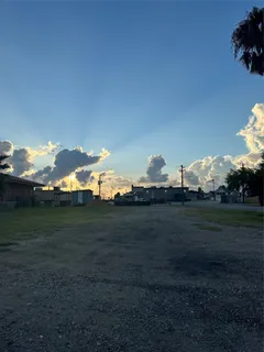 a view of a golf course with a lake