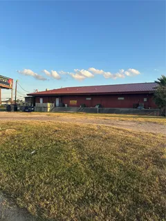 a view of a swimming pool with an outdoor seating