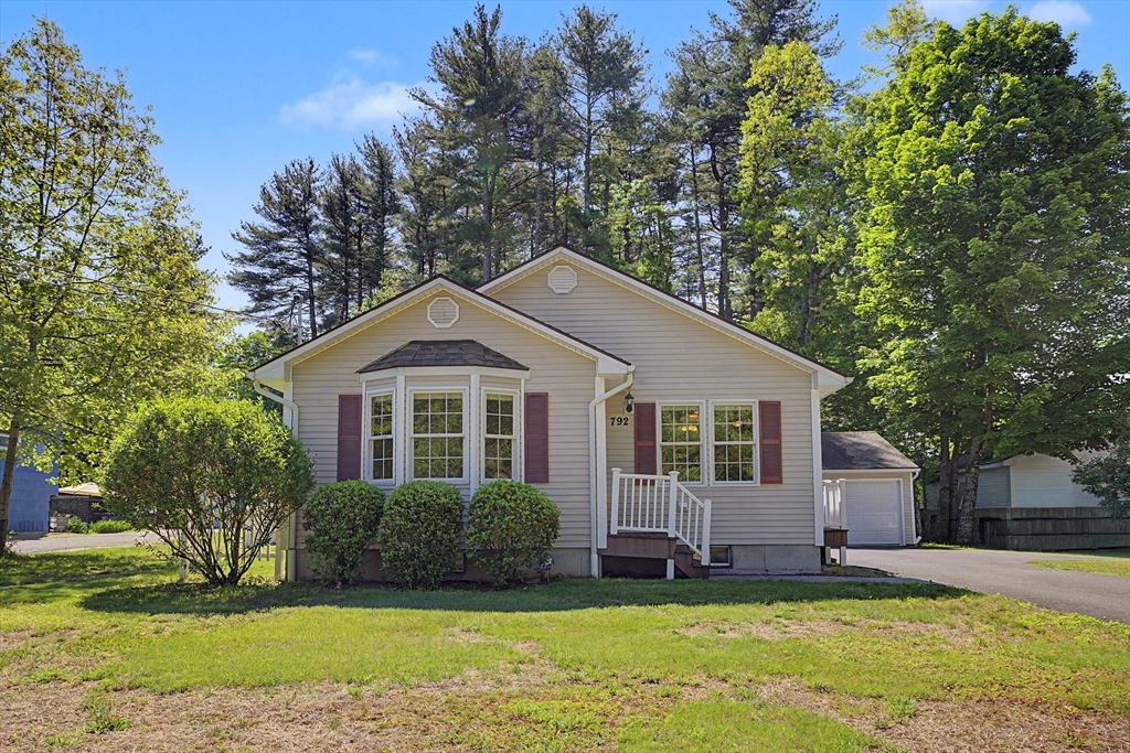 792 Ryan Road Northampton, MA 01062 - Photo 1 of 29 a front view of a house with a yard