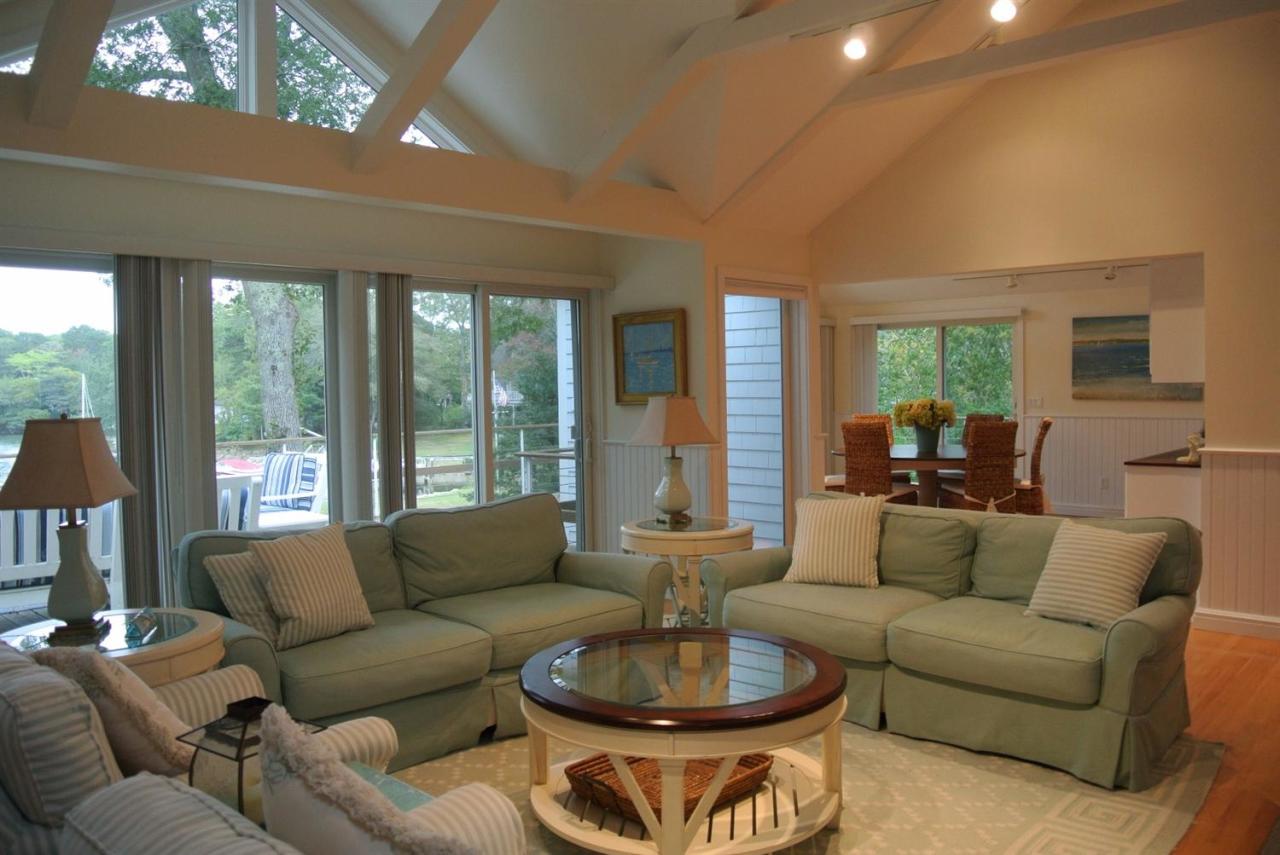 118 Wading Place Road Mashpee, MA 02649 - Photo 14 of 32 a living room with furniture and a large window