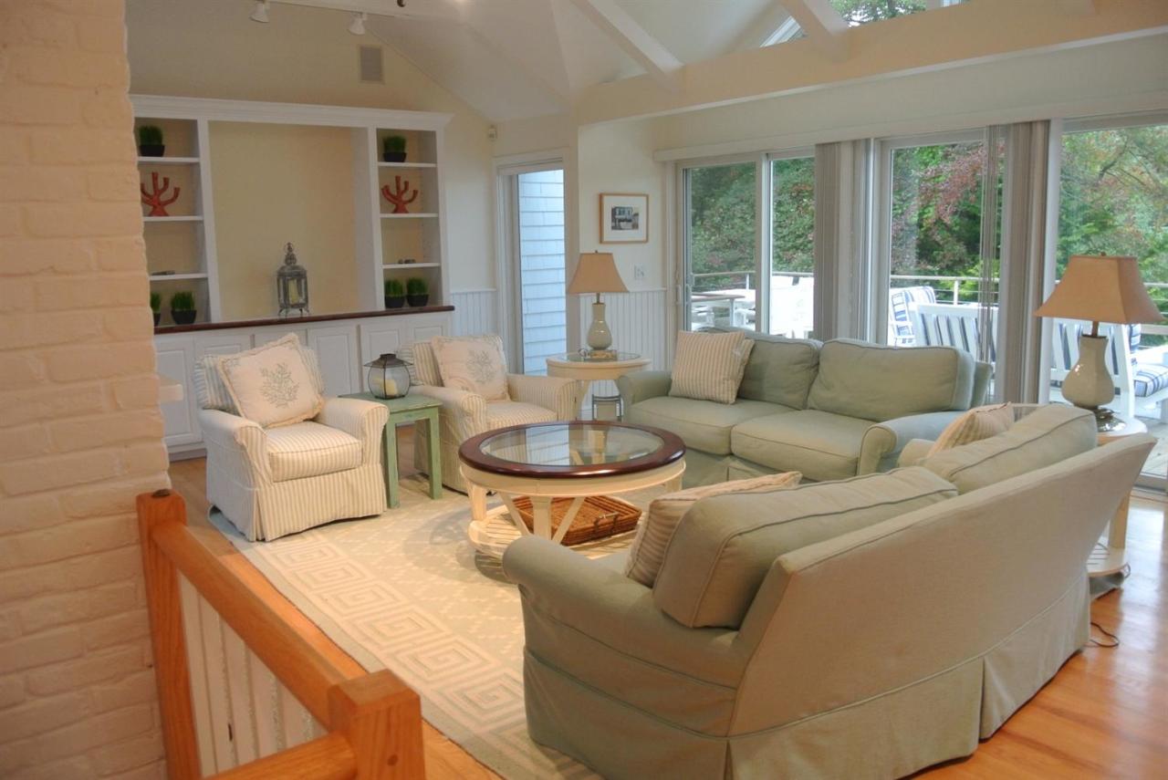 118 Wading Place Road Mashpee, MA 02649 - Photo 6 of 32 a living room with furniture and a potted plant