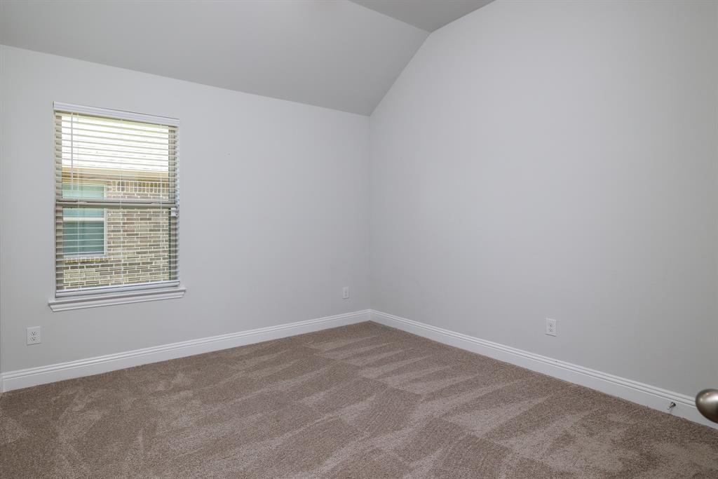 118 Sycamore Street Balch Springs, TX 75181 - Photo 21 of 34 an empty room with a window