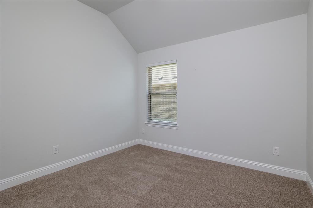 118 Sycamore Street Balch Springs, TX 75181 - Photo 22 of 34 an empty room with a window