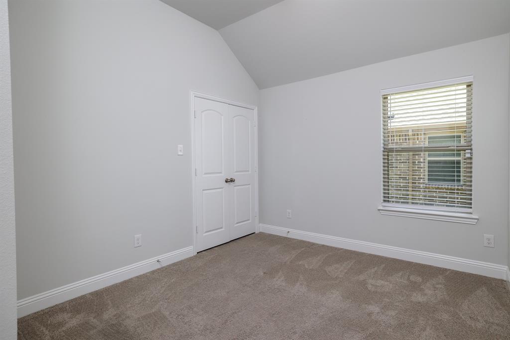 118 Sycamore Street Balch Springs, TX 75181 - Photo 23 of 34 an empty room with a window