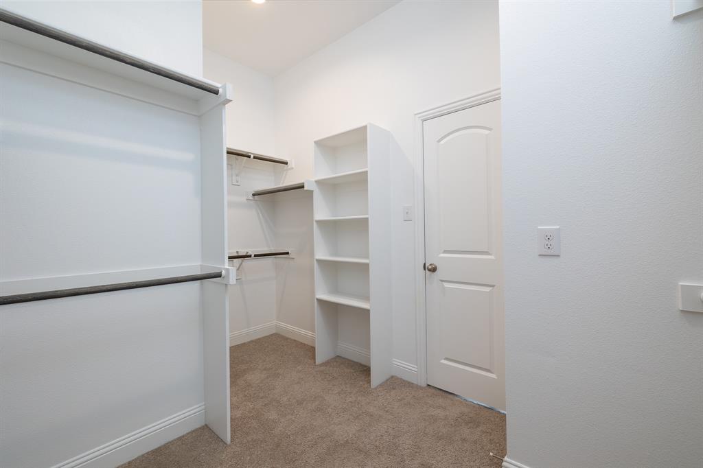 118 Sycamore Street Balch Springs, TX 75181 - Photo 28 of 34 a view of an empty walk in closet