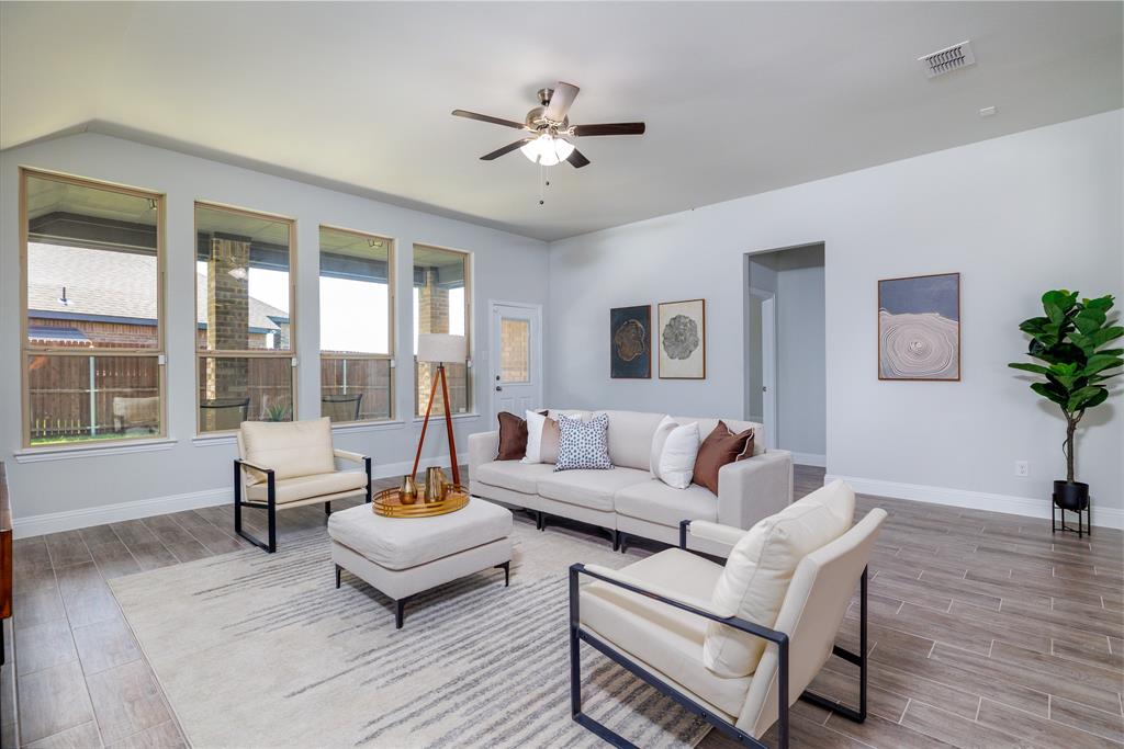 118 Sycamore Street Balch Springs, TX 75181 - Photo 6 of 34 a living room with furniture and a large window