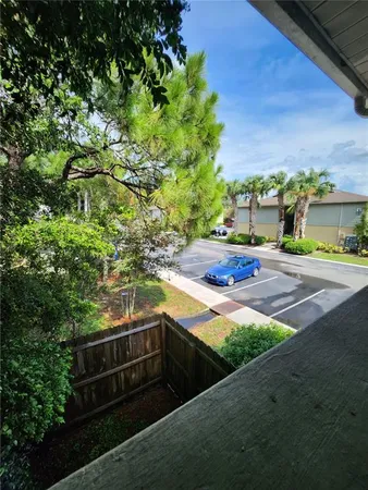 a front view of a house with parking space