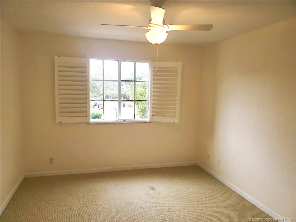 5309 Southeast Jennings Lane Stuart, FL 34997 - Photo 13 of 23 an empty room with a window