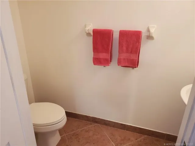 a view of swimming pool with an outdoor seating