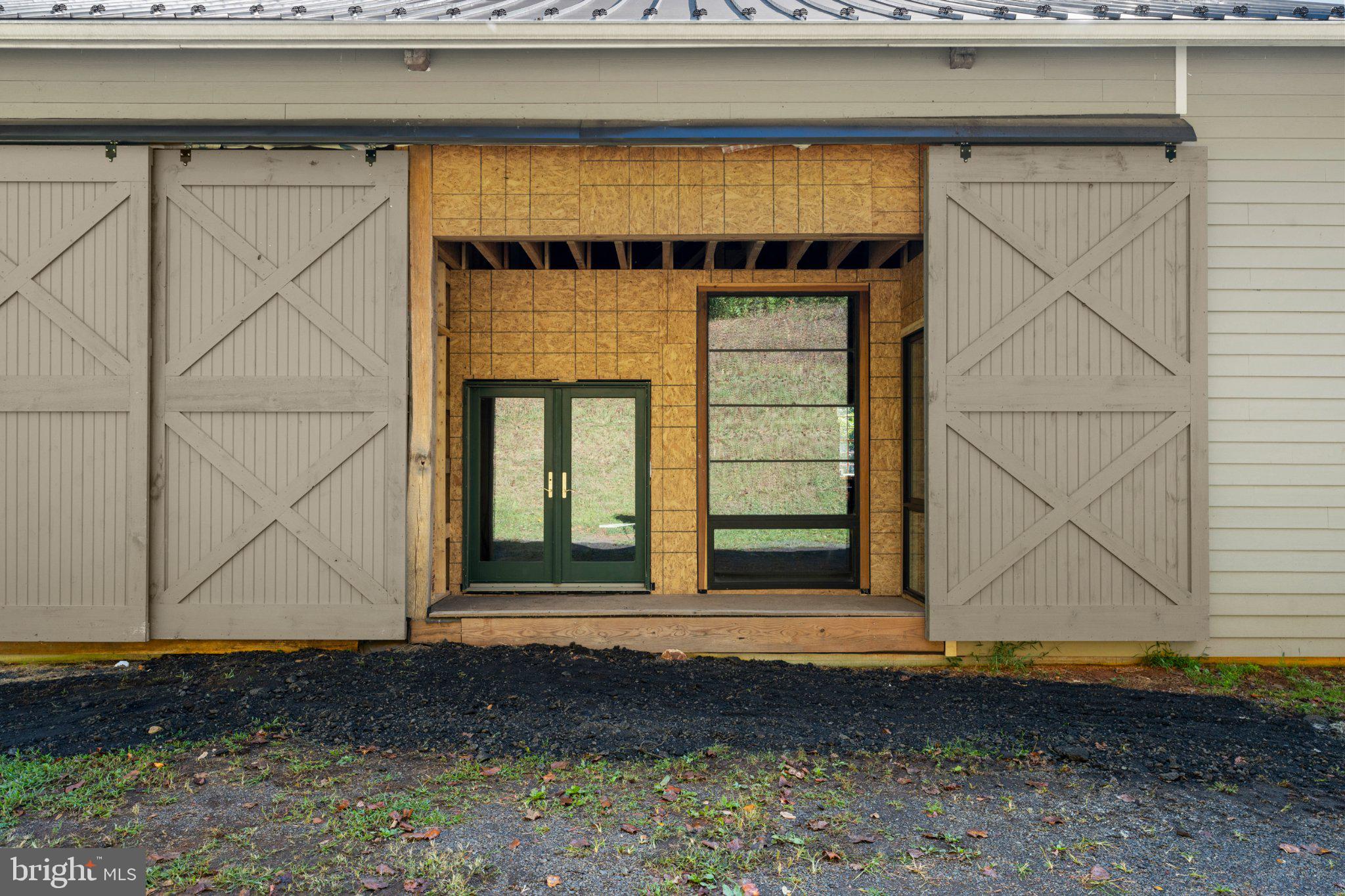 439 Rudasill Road Woodville, VA 22749 - Photo 36 of 55 Four extra-tall sliding barn doors.