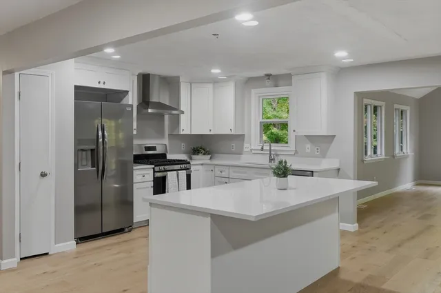 a backyard of a house with lots of green space