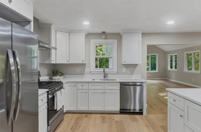 a view of balcony with wooden floor