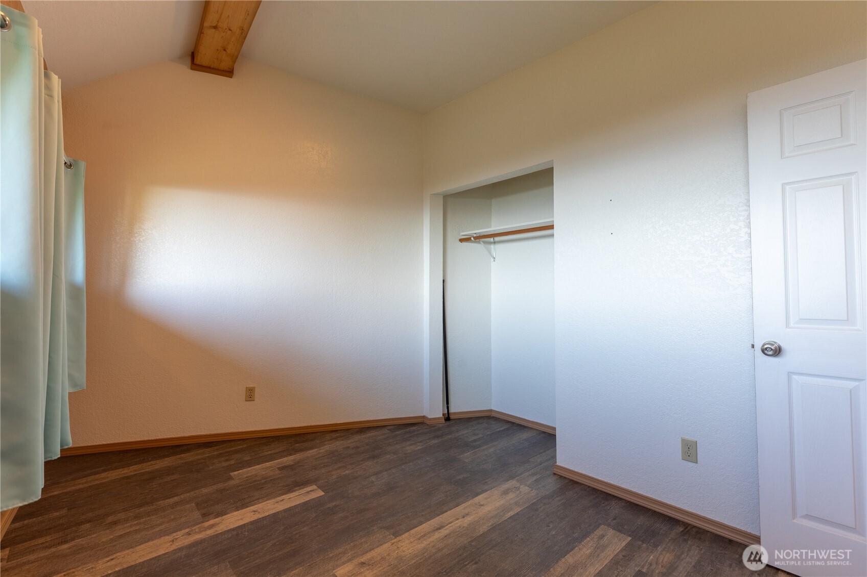 90 Dawnsridge Road Sekiu, WA 98381 - Photo 15 of 40 an empty room with wooden floor and windows