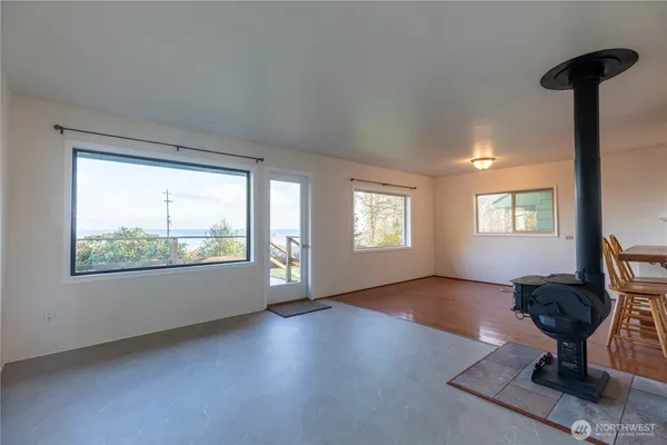 a view of front door with wooden floor