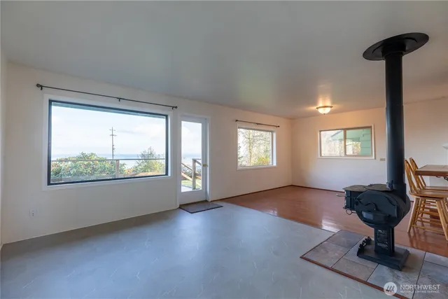 a view of front door with wooden floor