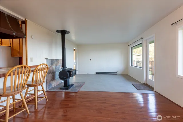 a view of a room with a large window