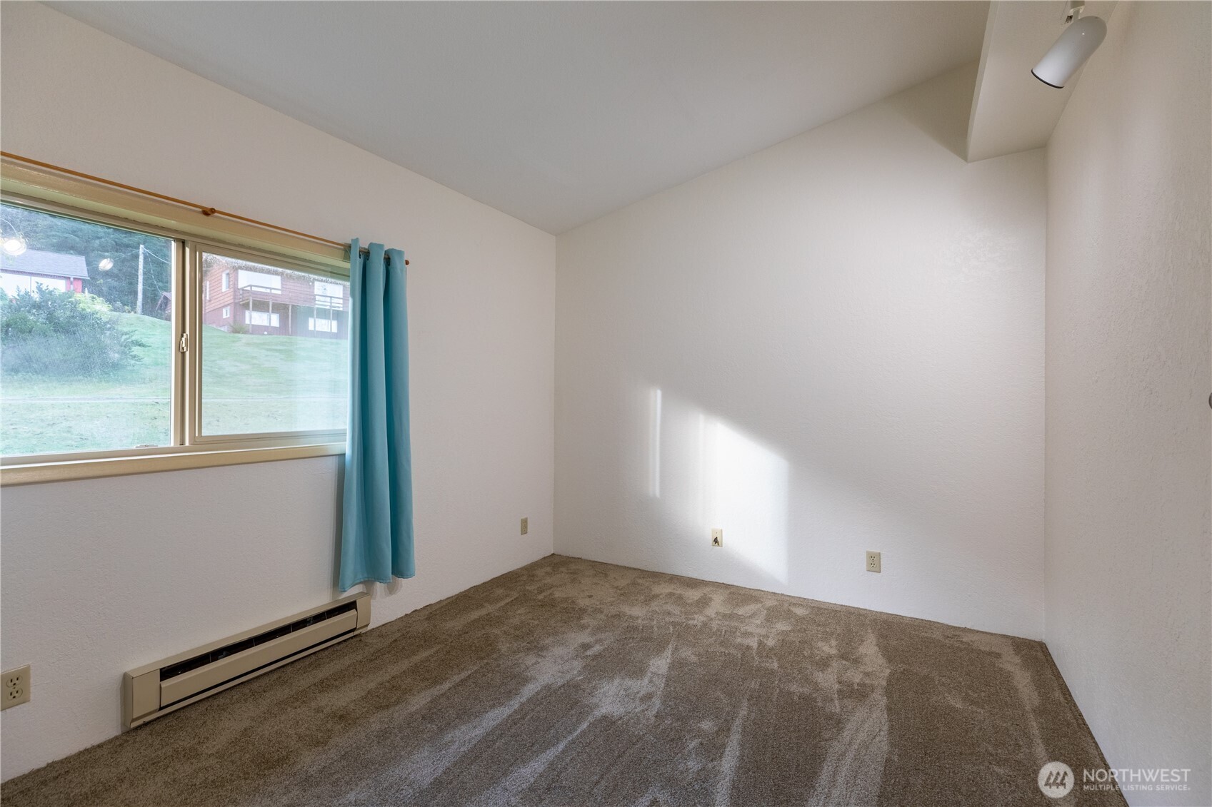 90 Dawnsridge Road Sekiu, WA 98381 - Photo 26 of 40 an empty room with a window