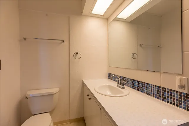 a view of a city with a house in background