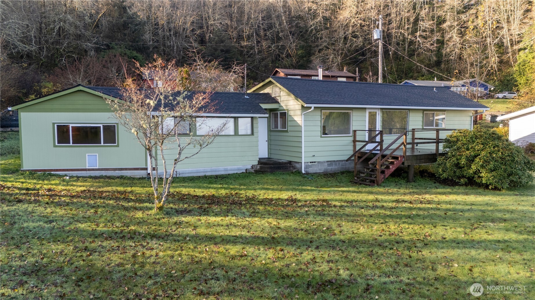 90 Dawnsridge Road Sekiu, WA 98381 - Photo 32 of 40 a front view of a house with a garden