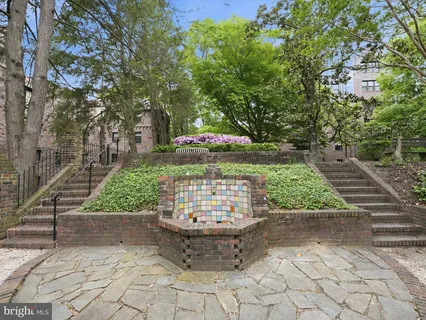 a view of a back yard of the house and a garden