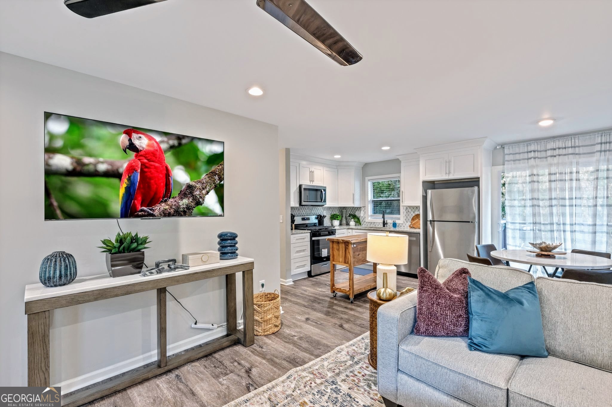 3590 Ponderosa Lane Powder Springs, GA 30127 - Photo 1 of 25 a living room with furniture kitchen view and a large window
