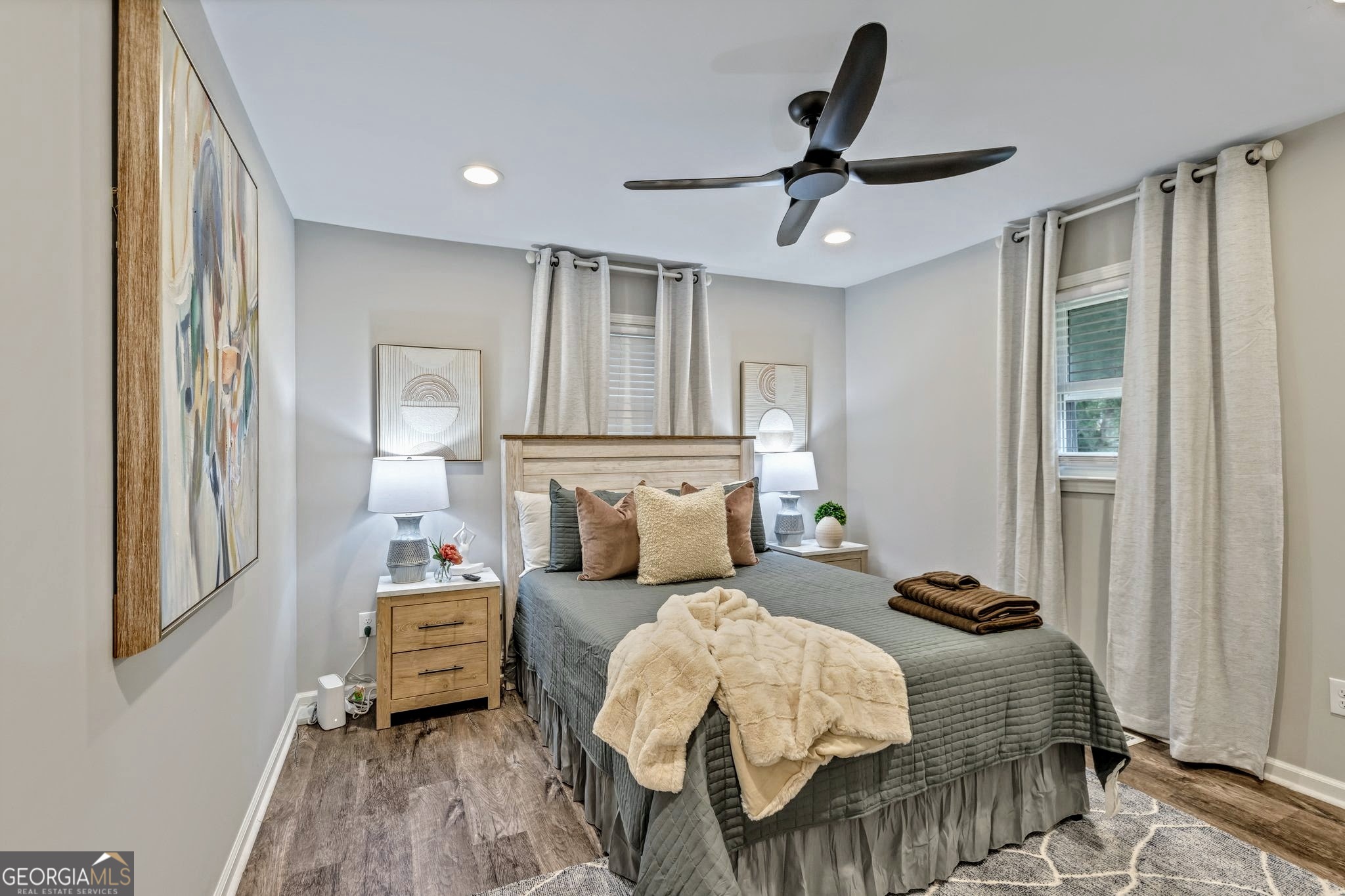 3590 Ponderosa Lane Powder Springs, GA 30127 - Photo 11 of 25 a bedroom with a bed and a chandelier