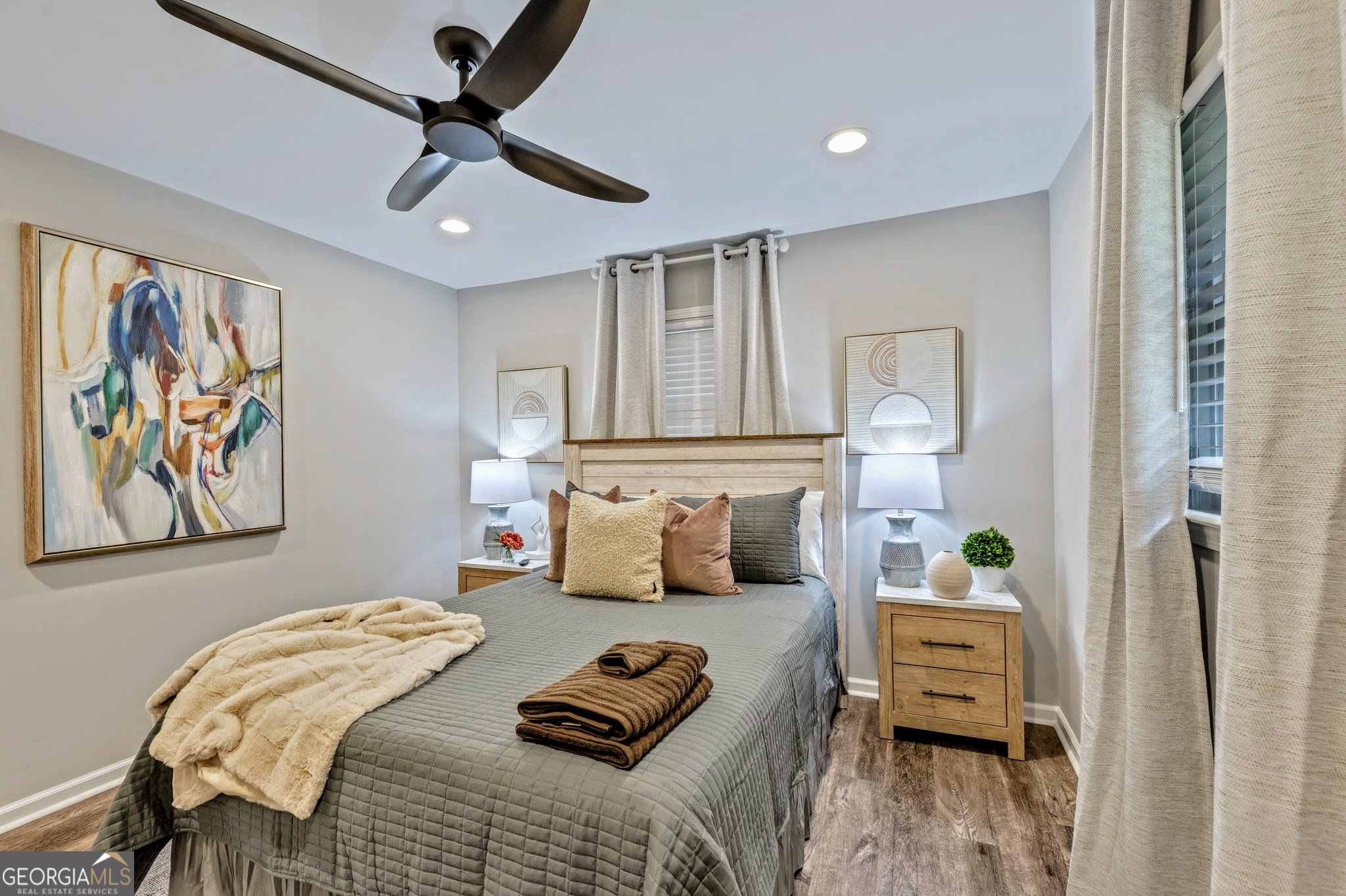 3590 Ponderosa Lane Powder Springs, GA 30127 - Photo 12 of 25 a bedroom with furniture and a chandelier