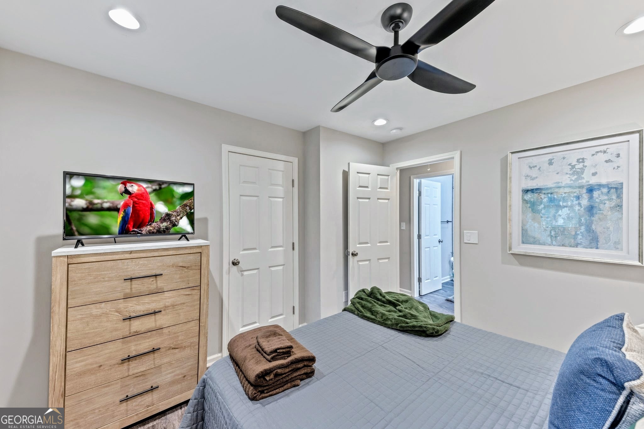 3590 Ponderosa Lane Powder Springs, GA 30127 - Photo 9 of 25 a bedroom with furniture and a dresser