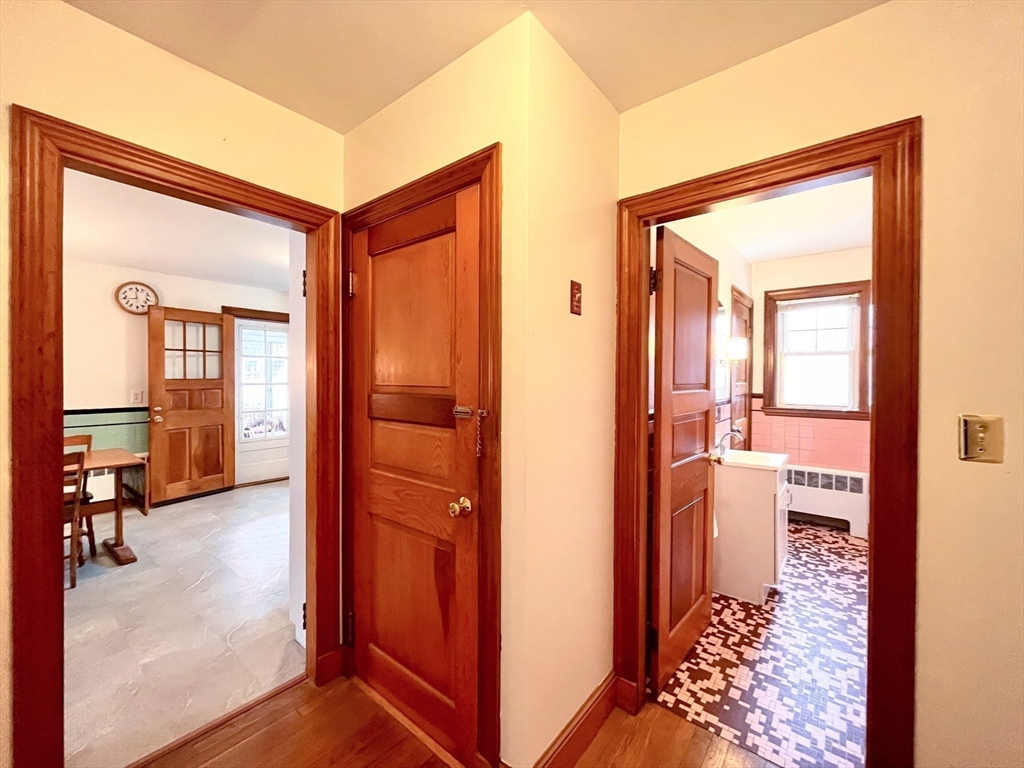 81 Topsfield Road Ipswich, MA 01938 - Photo 16 of 32 a view of a hallway and a livingroom with furniture
