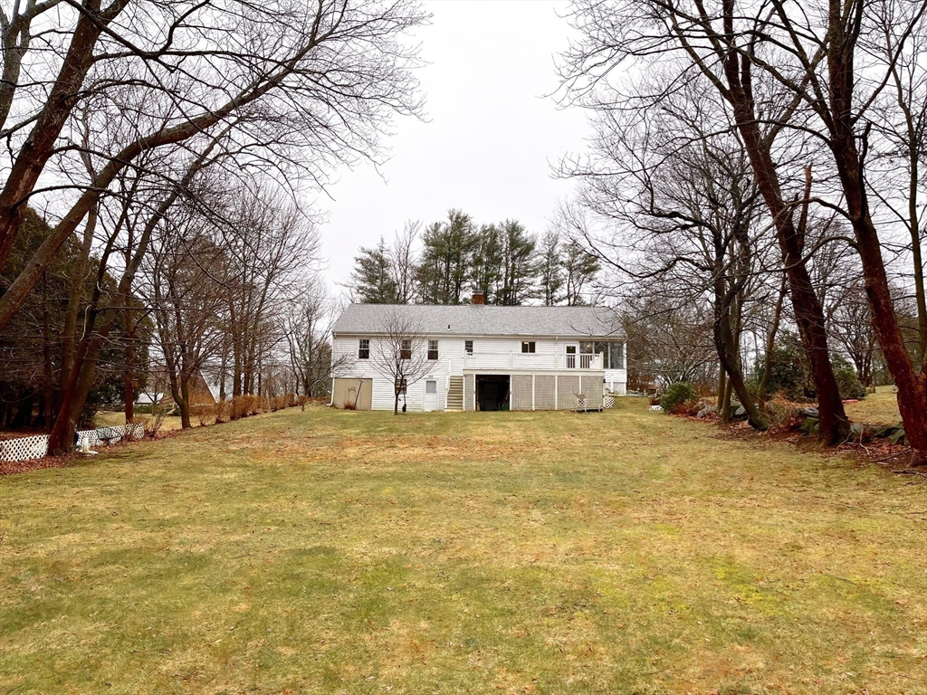 81 Topsfield Road Ipswich, MA 01938 - Photo 31 of 32 a house with trees in front of it