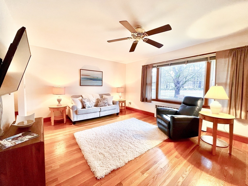 81 Topsfield Road Ipswich, MA 01938 - Photo 9 of 32 a living room with furniture and a large window
