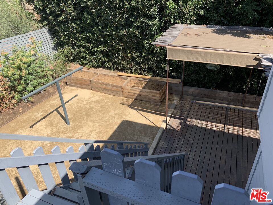 1107 Waterloo Street Los Angeles, CA 90026 - Photo 3 of 20 a terrace of a house with outdoor seating