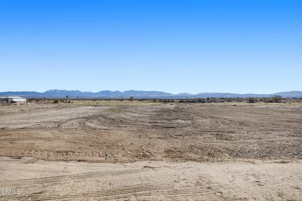 a view of a mountain with an outdoor space