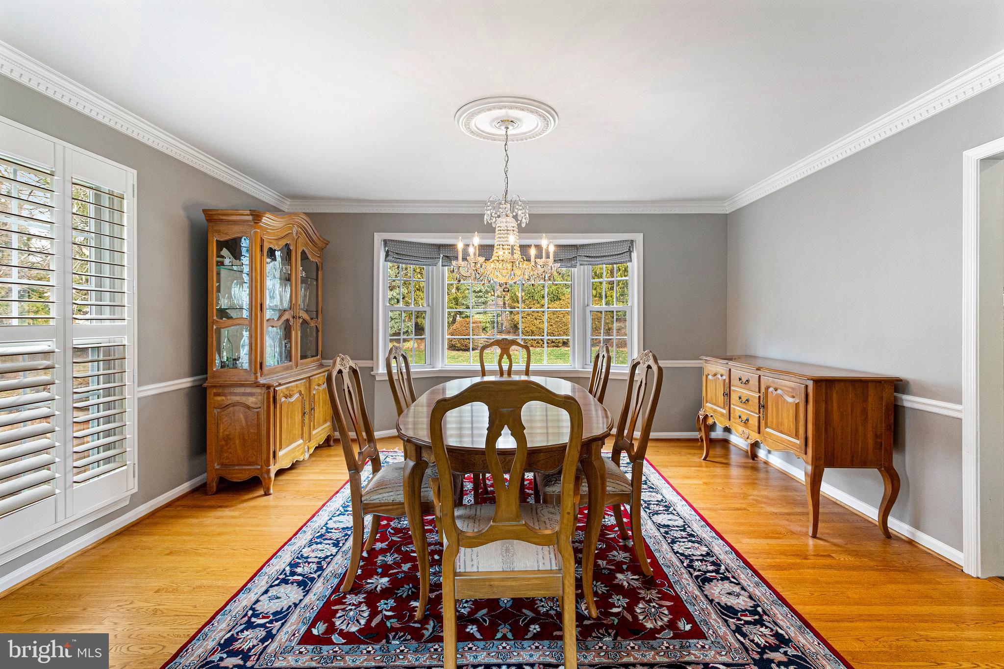 10904 Equestrian Court Reston, VA 20190 - Photo 11 of 81 a view of a dining room with furniture window and wooden floor