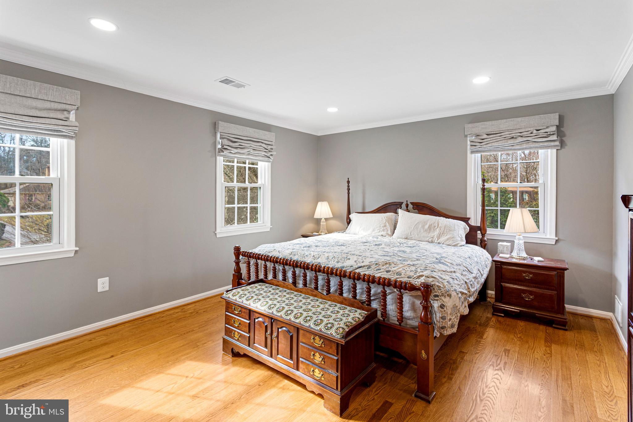 10904 Equestrian Court Reston, VA 20190 - Photo 31 of 81 a bedroom with a bed chair and a window