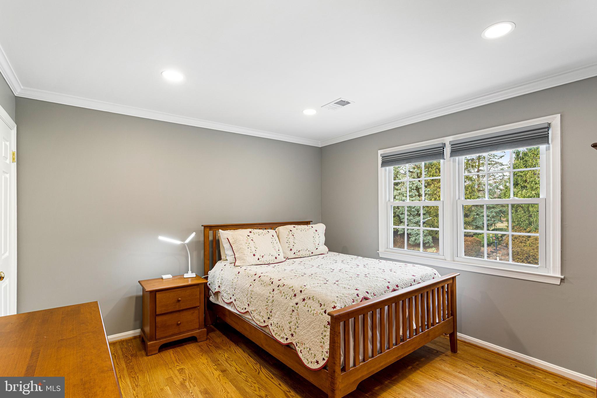 10904 Equestrian Court Reston, VA 20190 - Photo 42 of 81 a bedroom with a bed window and a dresser