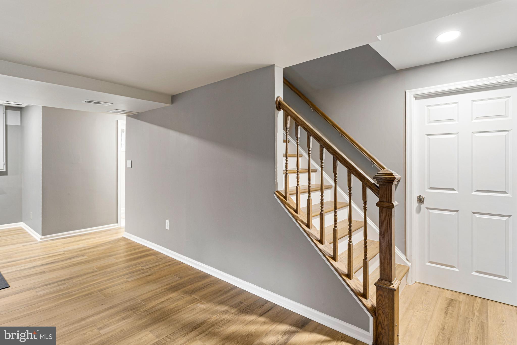 10904 Equestrian Court Reston, VA 20190 - Photo 51 of 81 a view of an entryway with wooden floor