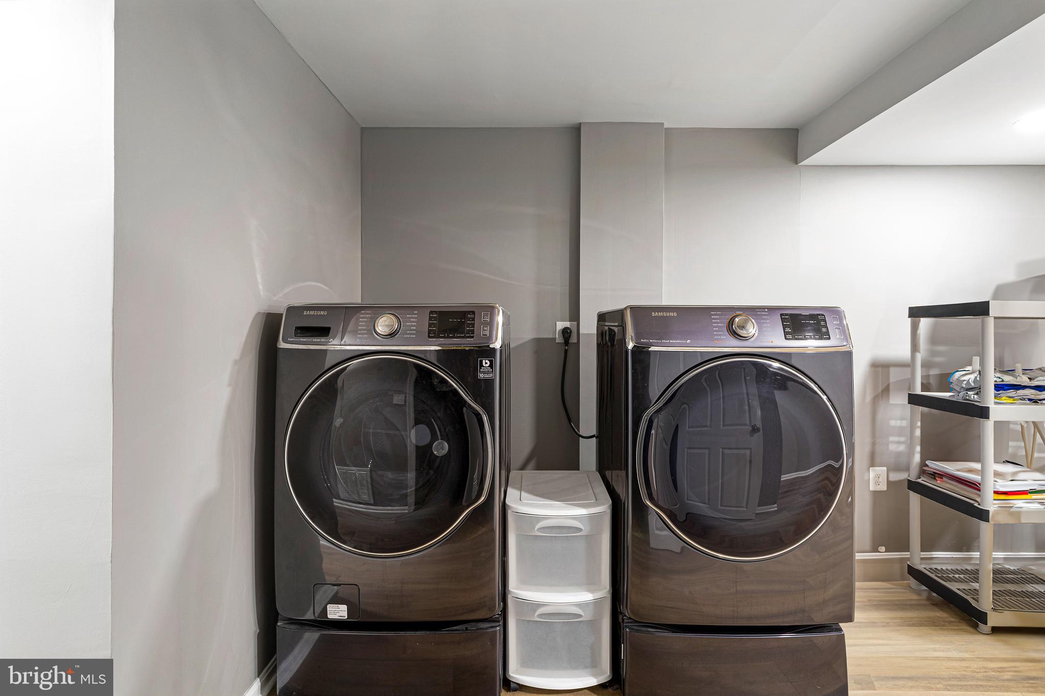 10904 Equestrian Court Reston, VA 20190 - Photo 58 of 81 a utility room with dryer and washer