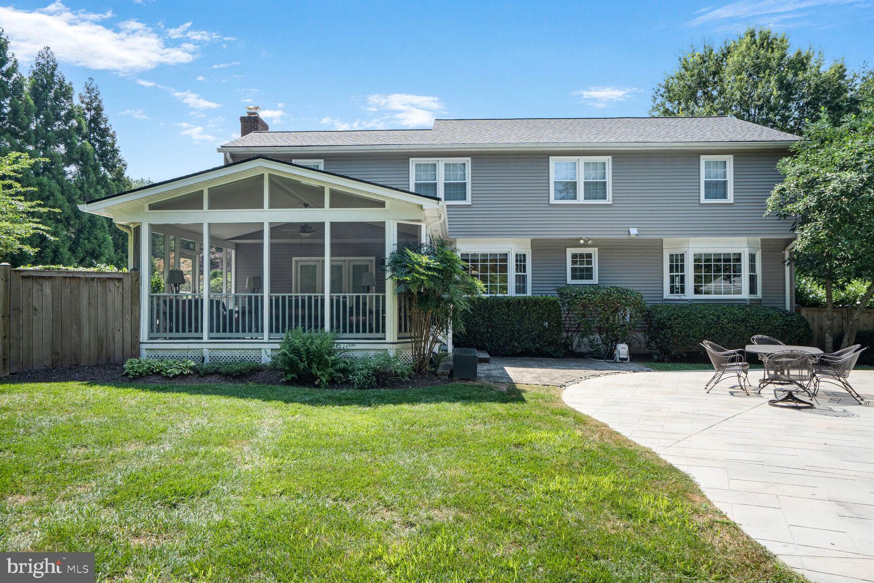 10904 Equestrian Court Reston, VA 20190 - Photo 60 of 81 a view of a house with sitting area and garden