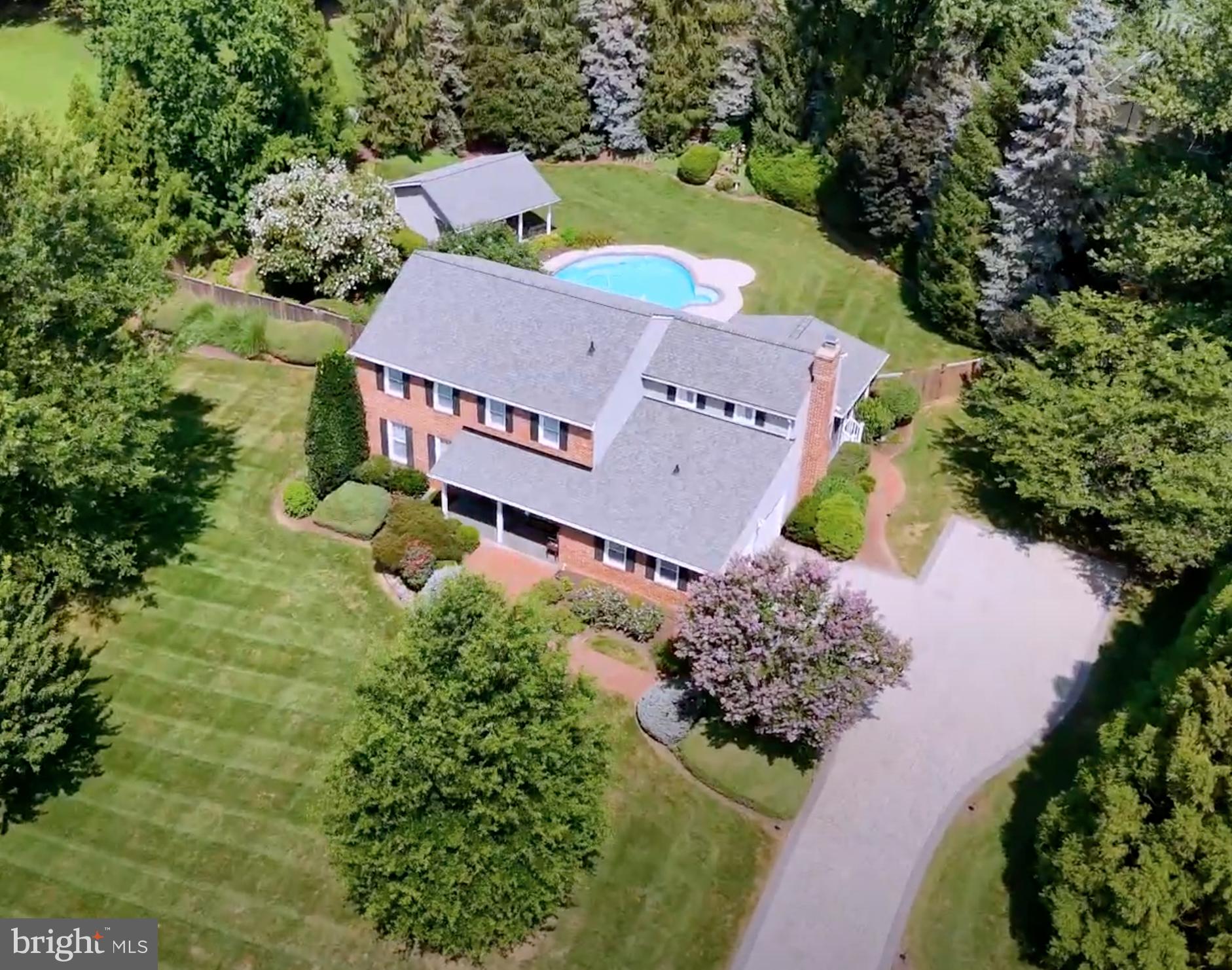 10904 Equestrian Court Reston, VA 20190 - Photo 75 of 81 an aerial view of a house with a yard basket ball court and outdoor seating